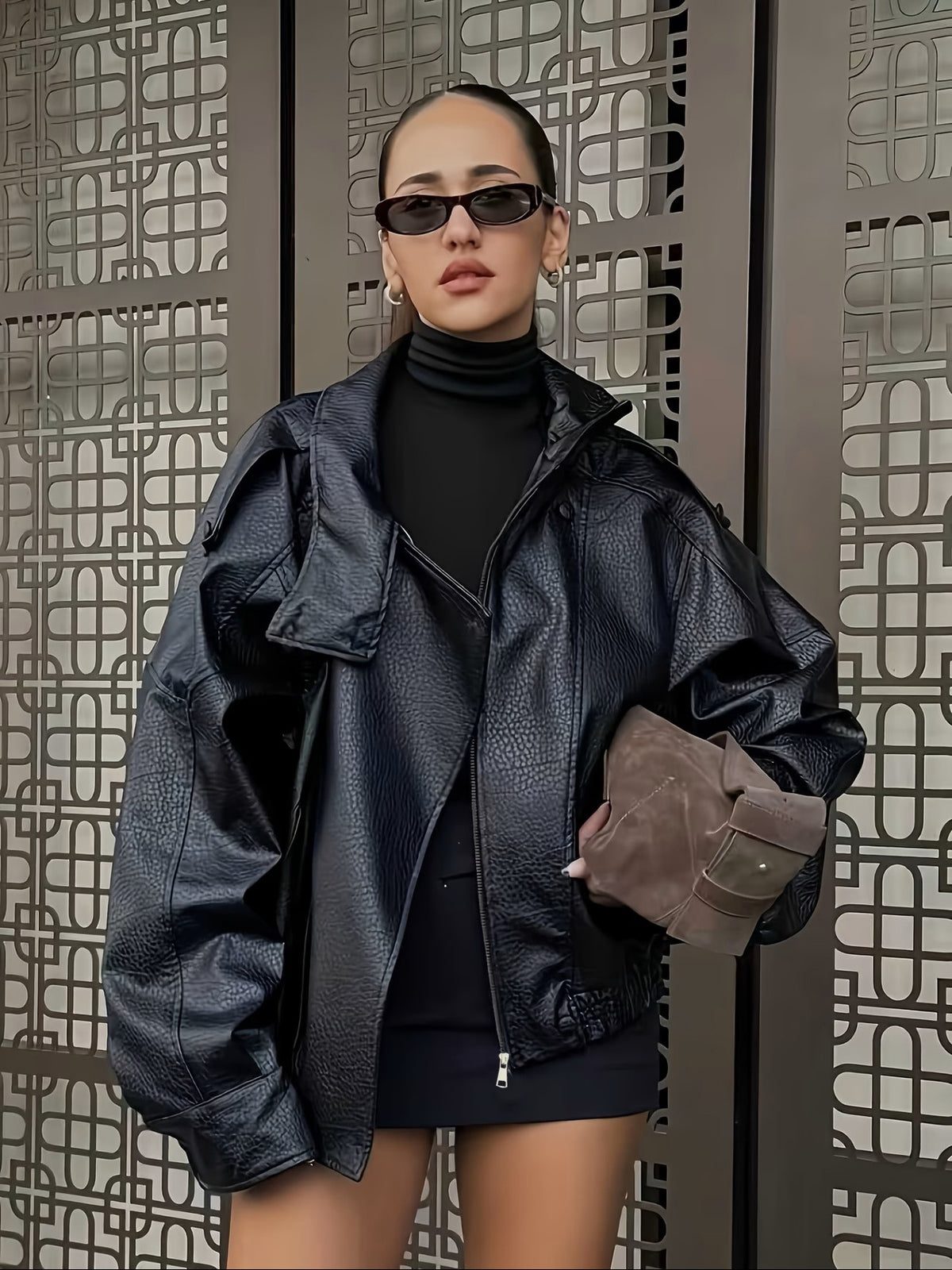 Black faux leather cropped moto jacket with asymmetric zip and flap chest pockets