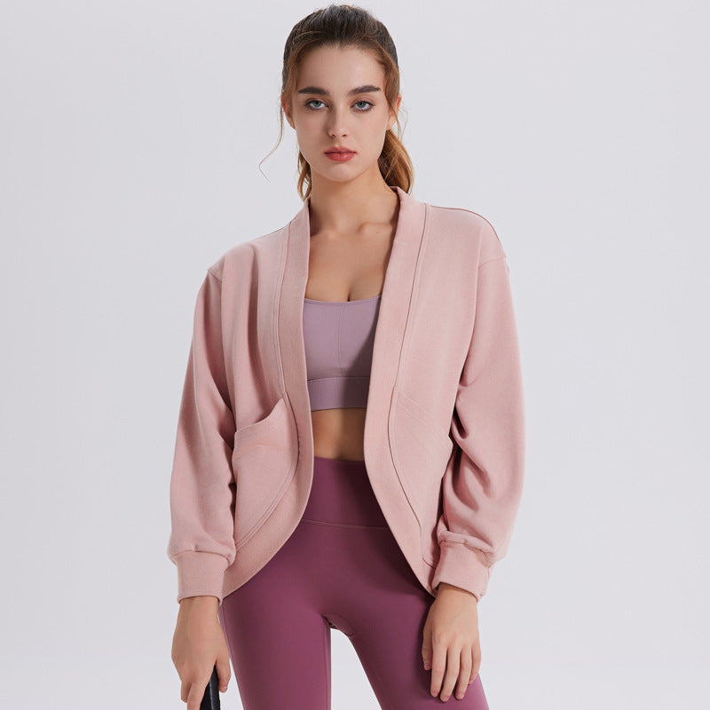 Women’s pink long-sleeve athletic cardigan top, open front, relaxed fit