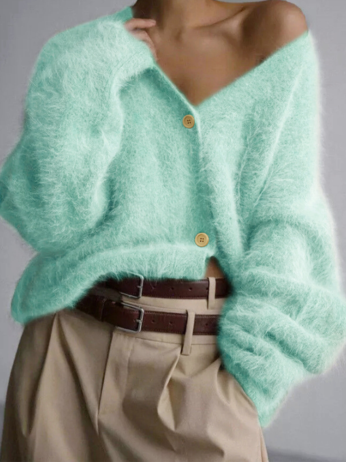 Fuzzy knit V-neck cardigan with long sleeves and button front, mint green
