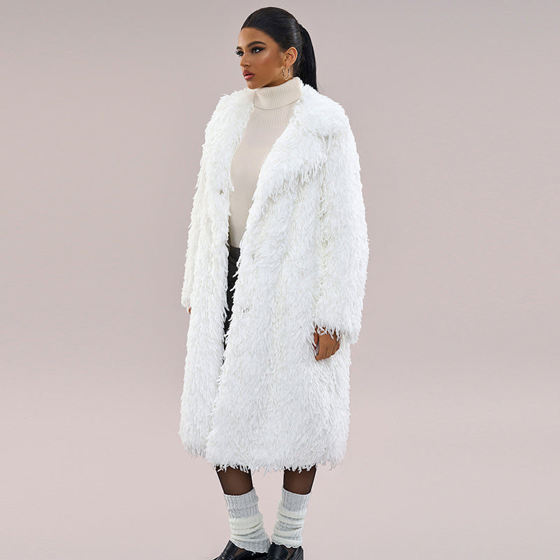 White faux fur long coat with open front, fluffy shaggy finish and fringe trim
