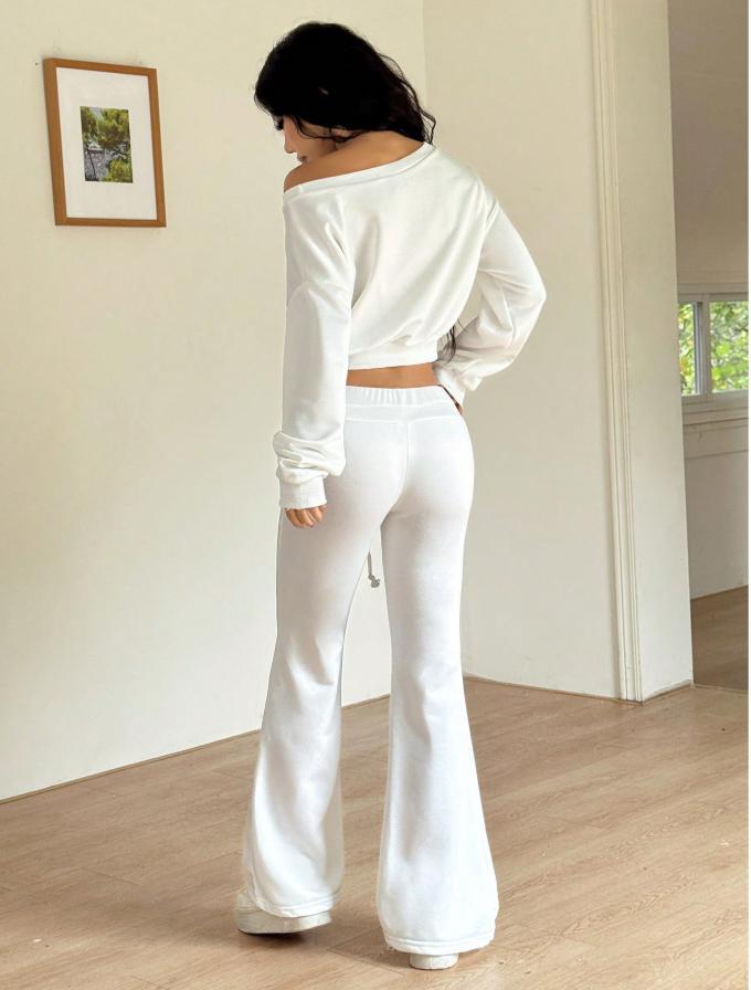 White sweatshirt and drawstring bell-bottom pants set, rear view