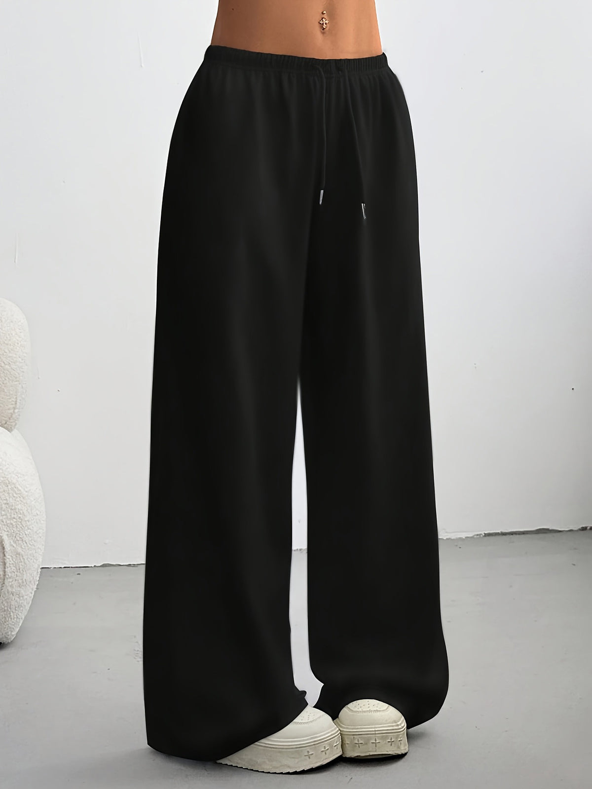 Women's high-waisted wide-leg sweatpants in black, full length with drawstring waist.