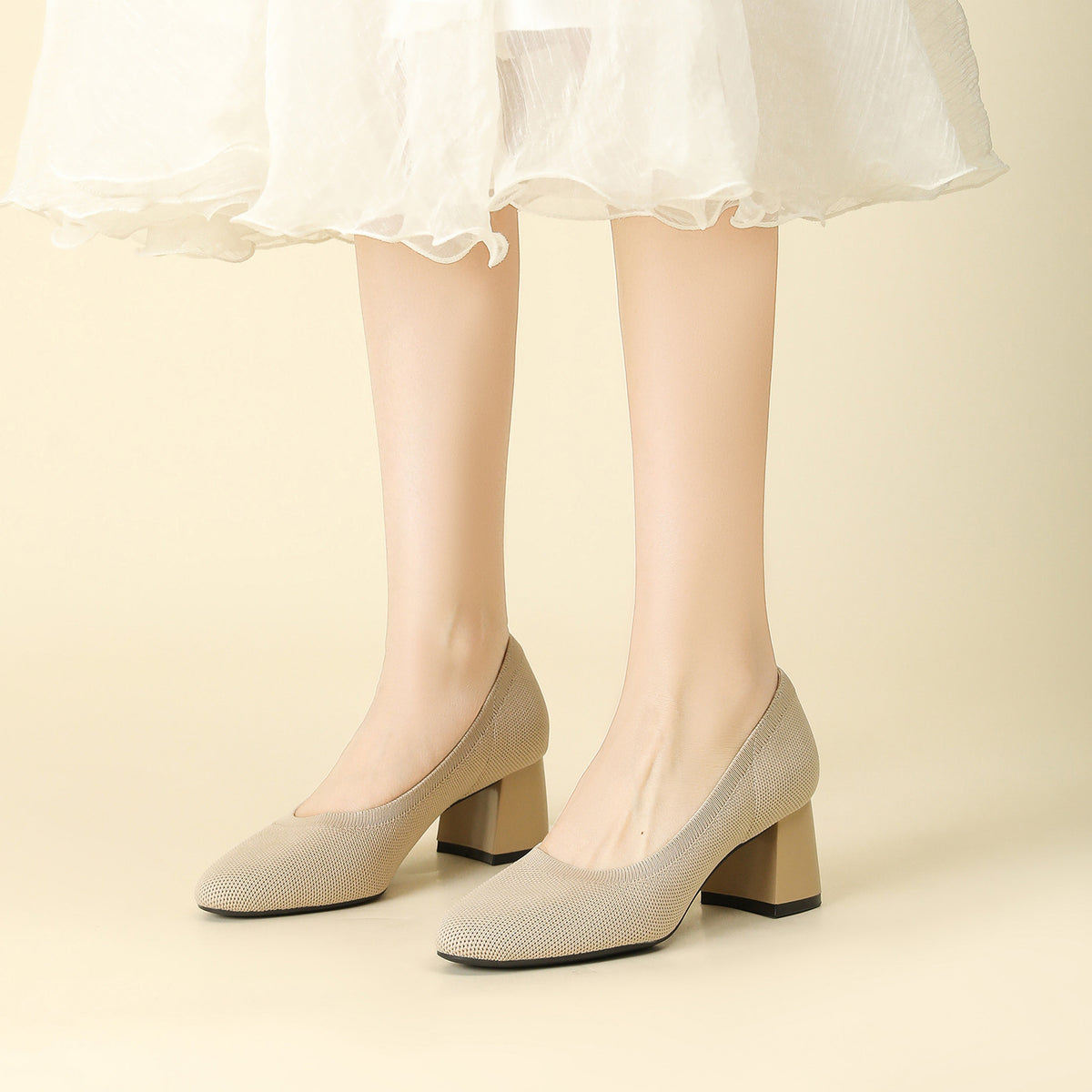 Beige knit pointed-toe shallow pumps with chunky block heel