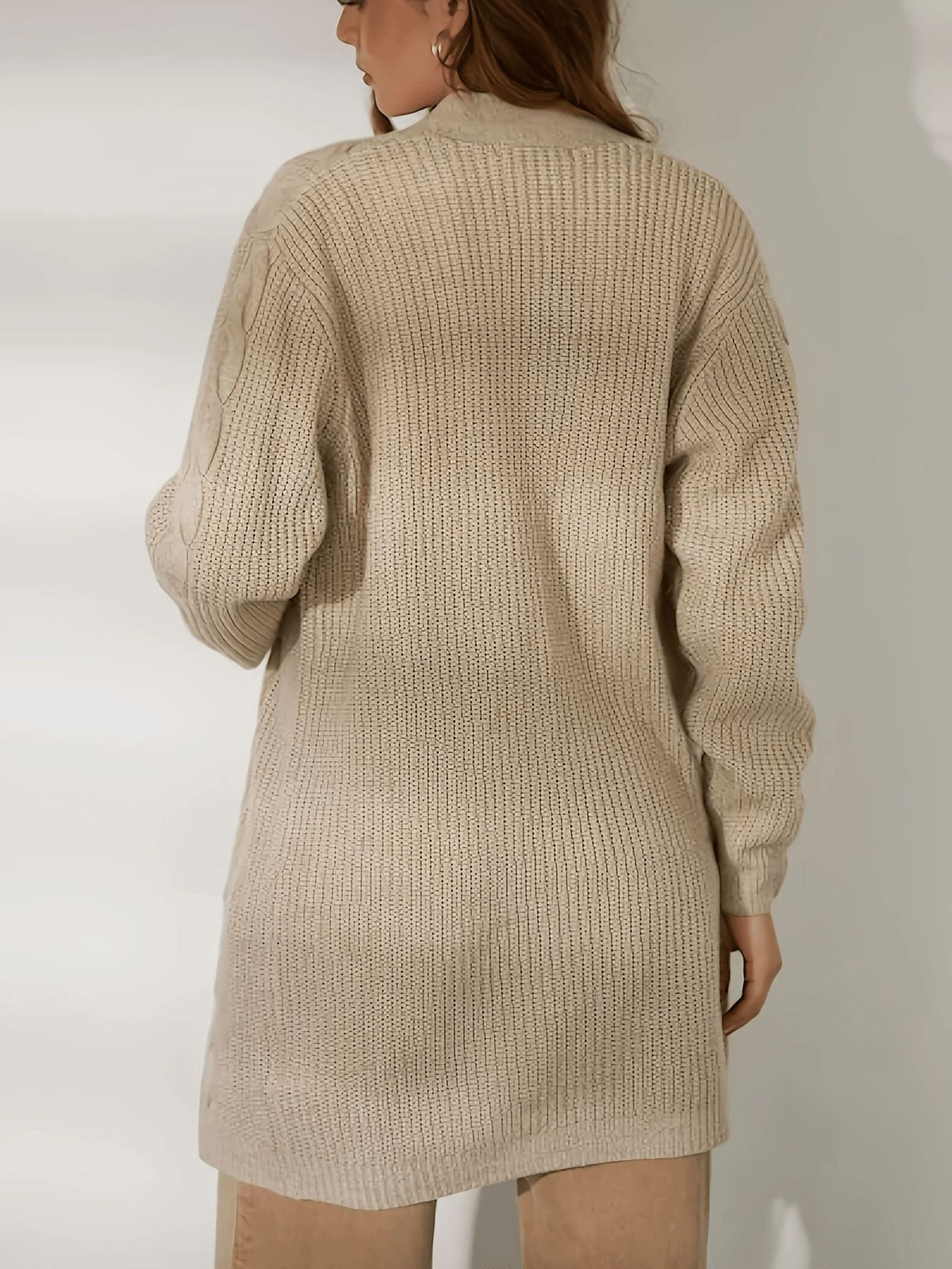 Khaki knit cardigan back view with long sleeves and textured cable pattern