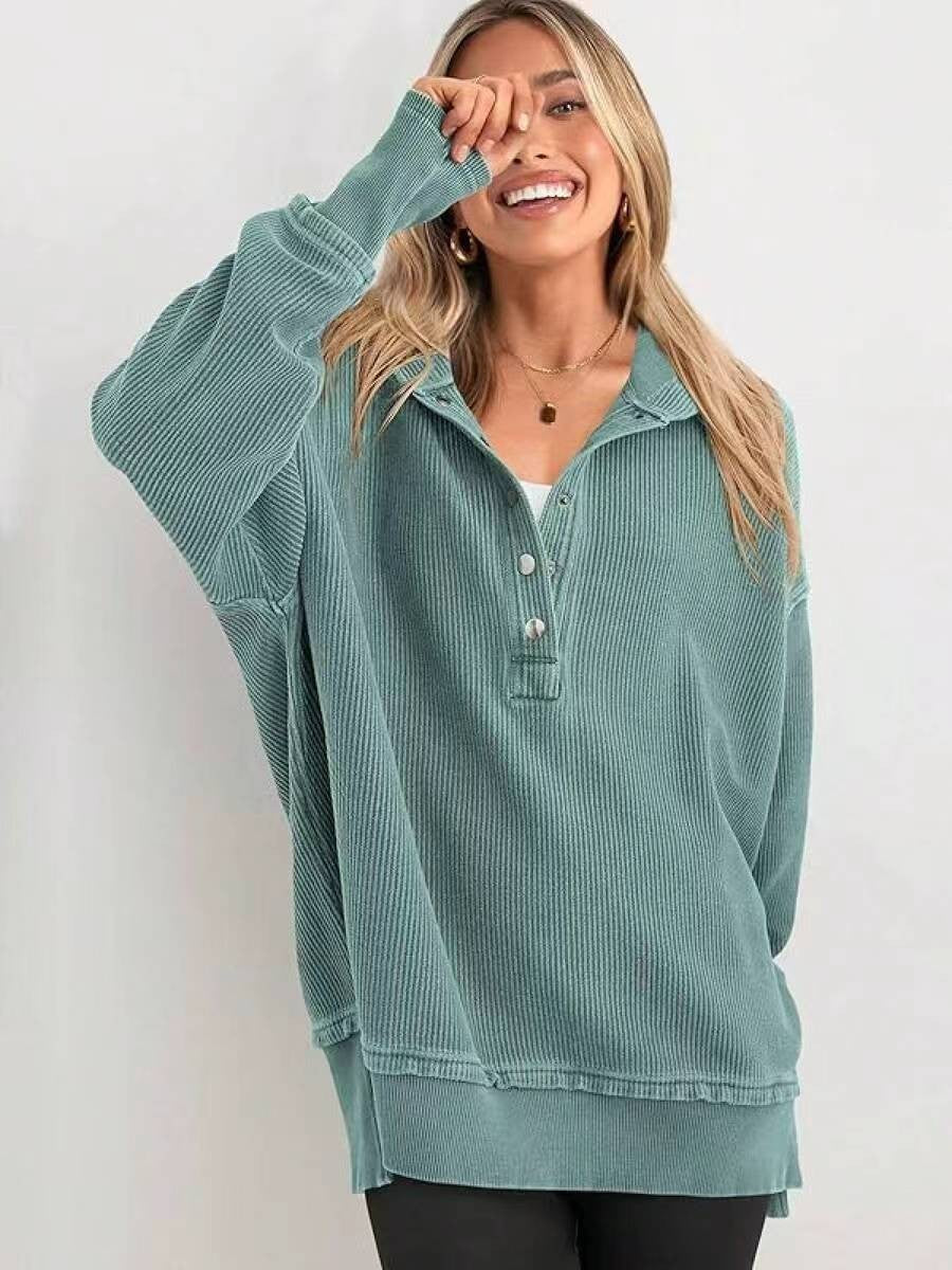 Teal hooded henley sweatshirt with button placket and loose raglan sleeves