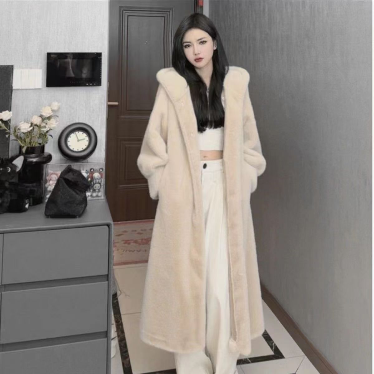 Cream long hooded faux fur coat with shawl collar and self tie belt