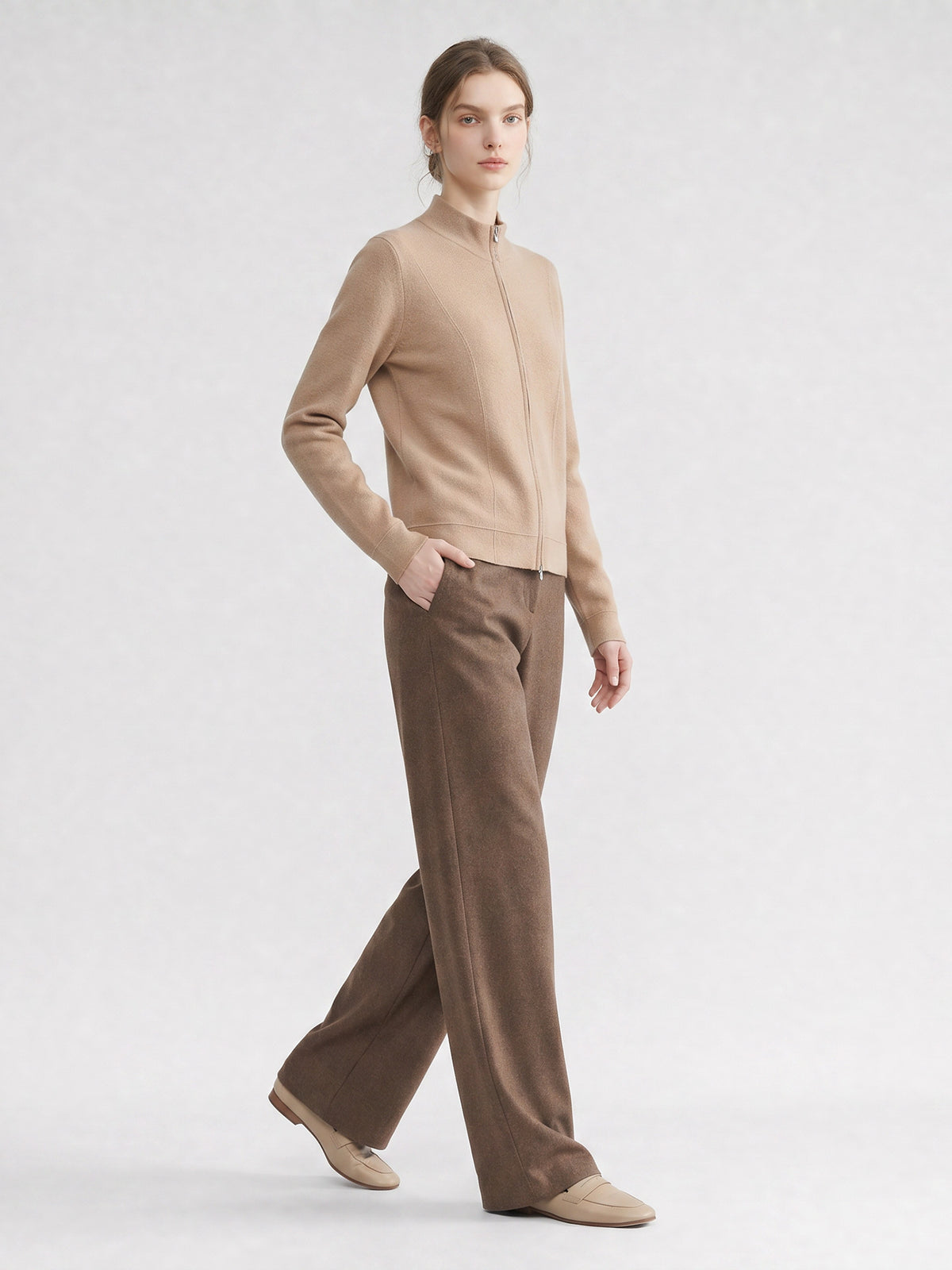 Women’s beige knit cardigan with stand-up collar and front zipper