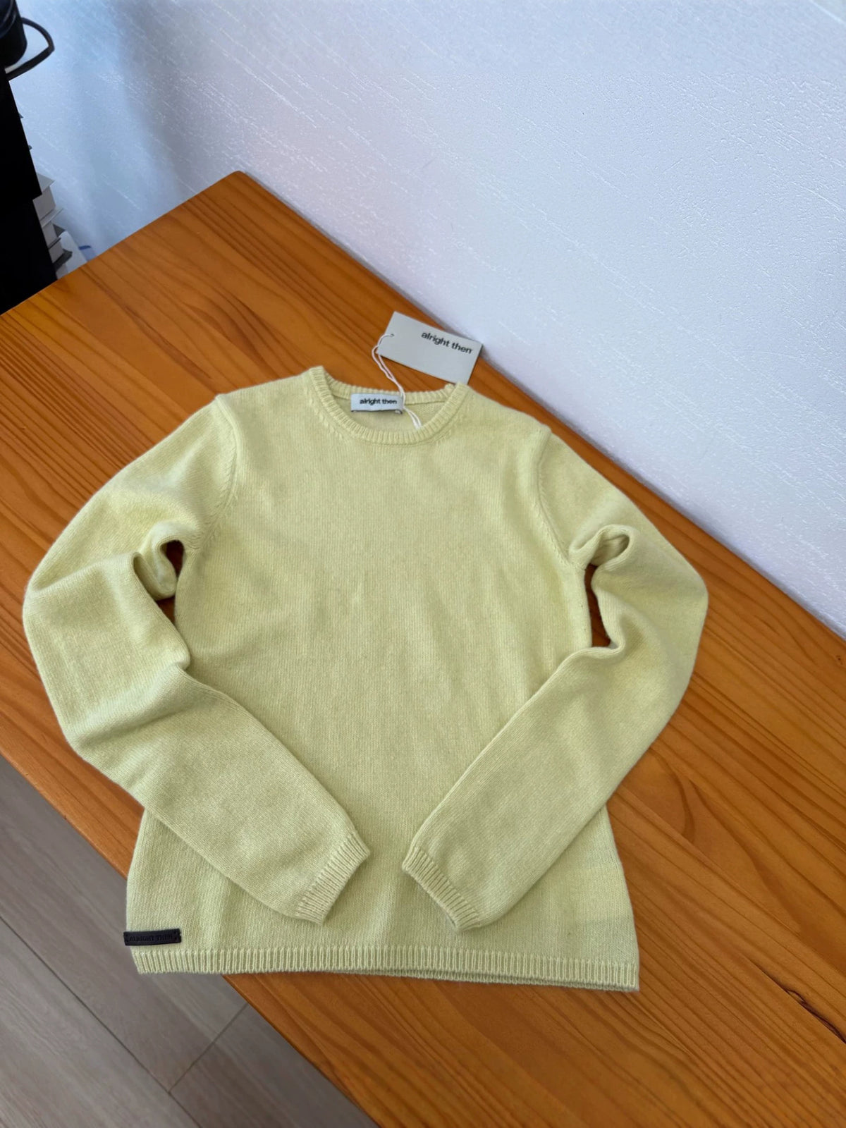 Wool knit sweater, fitted yellow crewneck pullover with long sleeves and ribbed cuffs