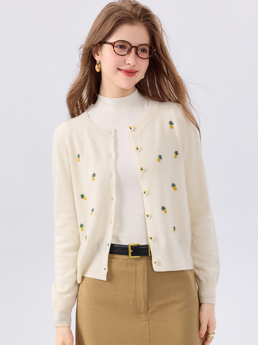 Cream wool cardigan sweater, round neck, button-front, long sleeves, colorful fruit print
