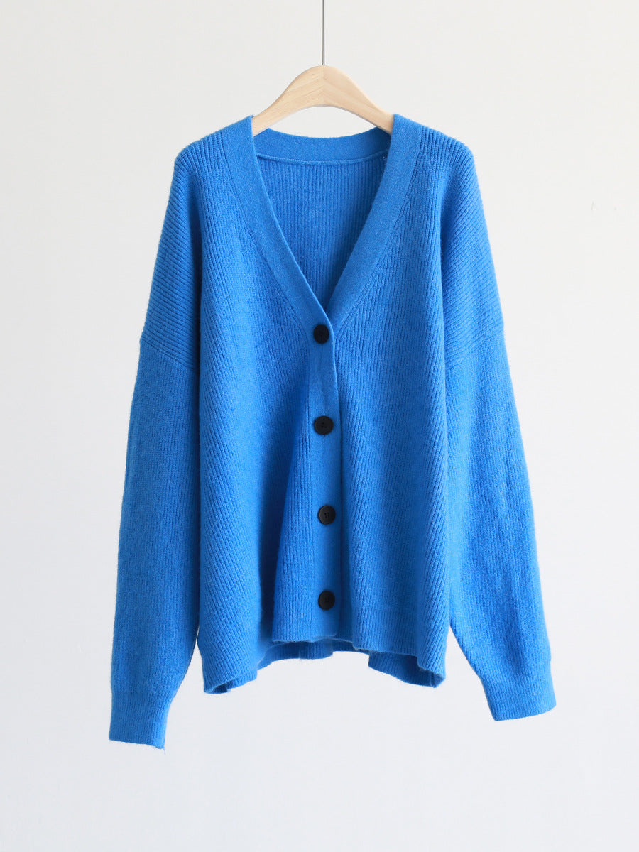 Blue V-neck mohair cardigan on hanger, button front and long sleeves