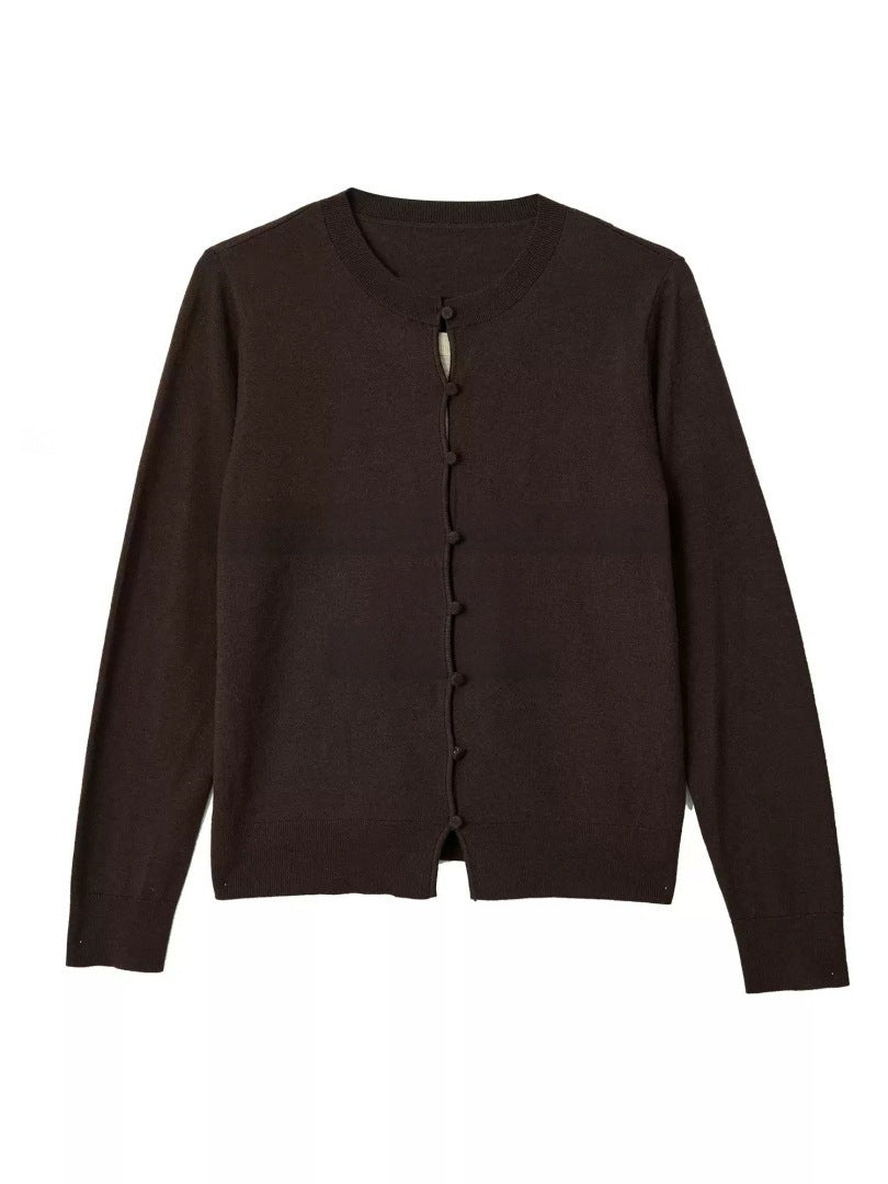 Brown knitted cardigan with button front, long sleeves, and hip length