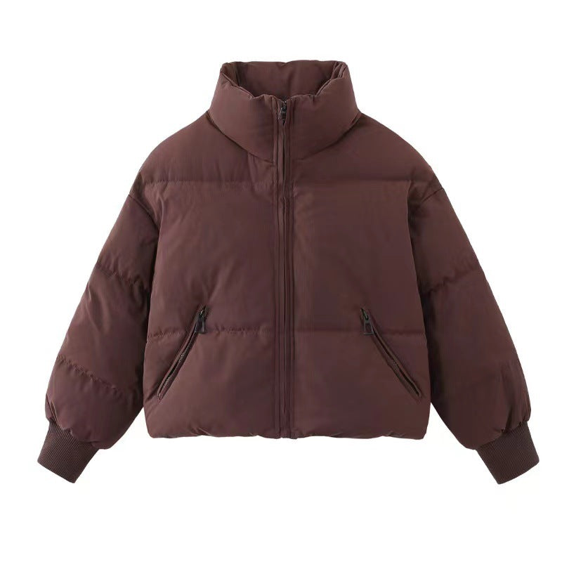 Short dark brown puffer jacket with full zip, stand collar, and ribbed cuffs