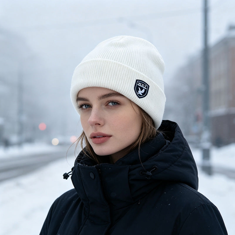 Fleece-lined knit beanie hat, white, ribbed cuff with small front logo patch