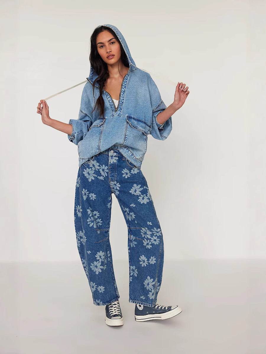 Light blue hooded denim jacket with half-zip, loose fit, and large front pocket