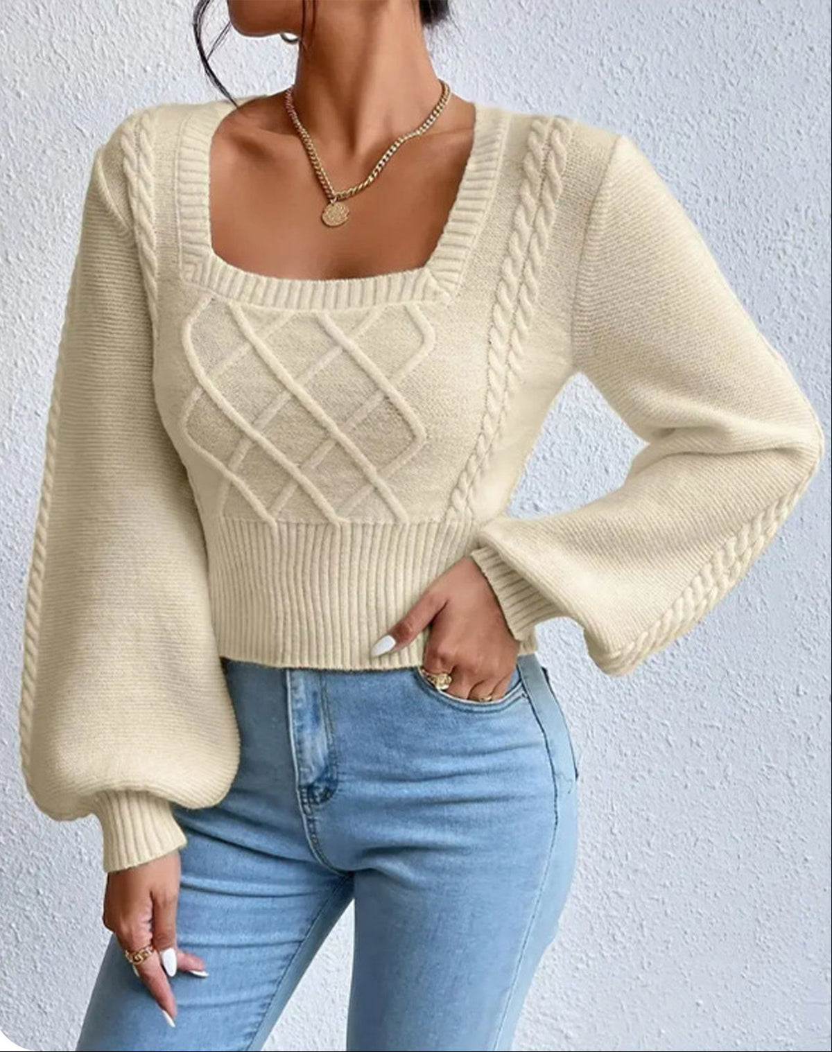 Women's cream cable-knit sweater with square neckline and ribbed long puff sleeves