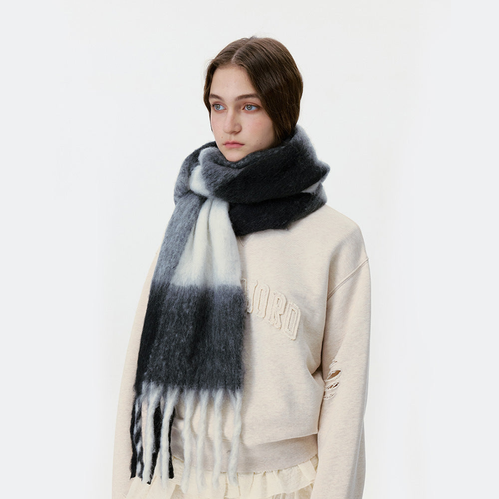 Women’s large plaid scarf in dark gray, light gray, and white with long fringe