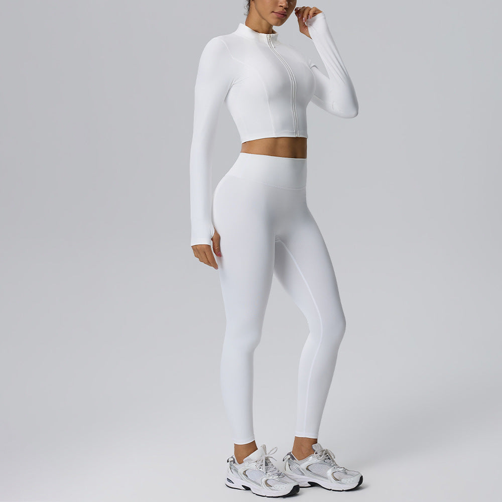 Women's white yoga set with zip long-sleeve crop top and fitted high-rise leggings