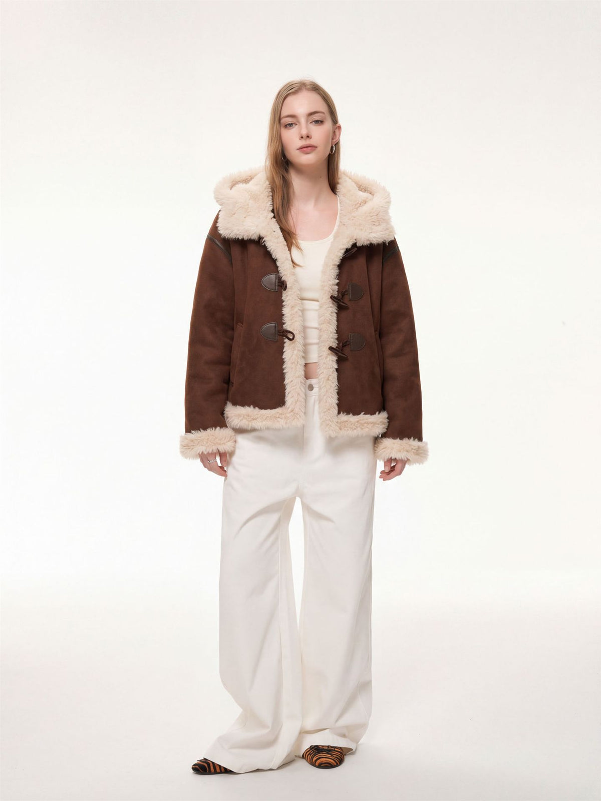 Women’s brown hooded suede shearling jacket with front placket and light fleece lining