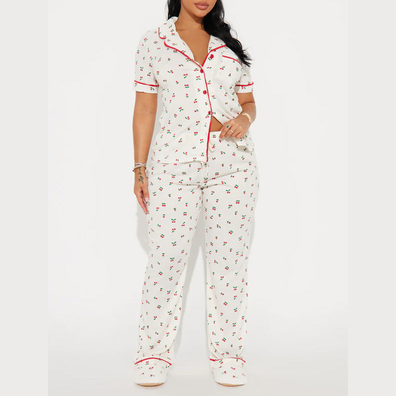 White printed women's front-open lapel pajama set with short sleeves and matching trousers