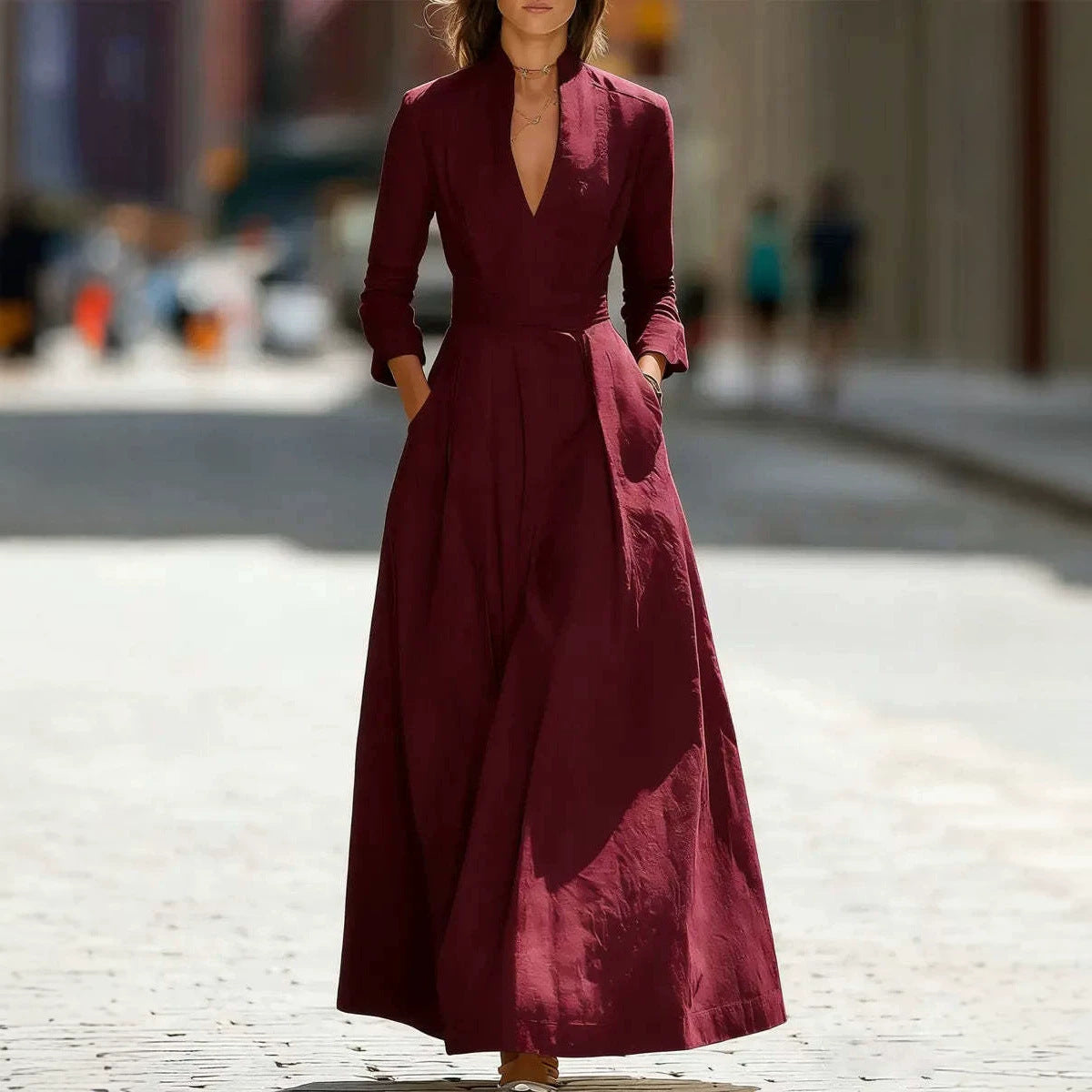 Wine red V-neck maxi dress with wide belt, long sleeves and full long skirt