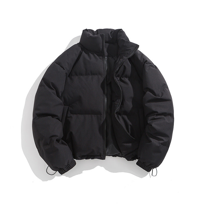 Black puffer jacket with stand collar and front zipper, long sleeves.