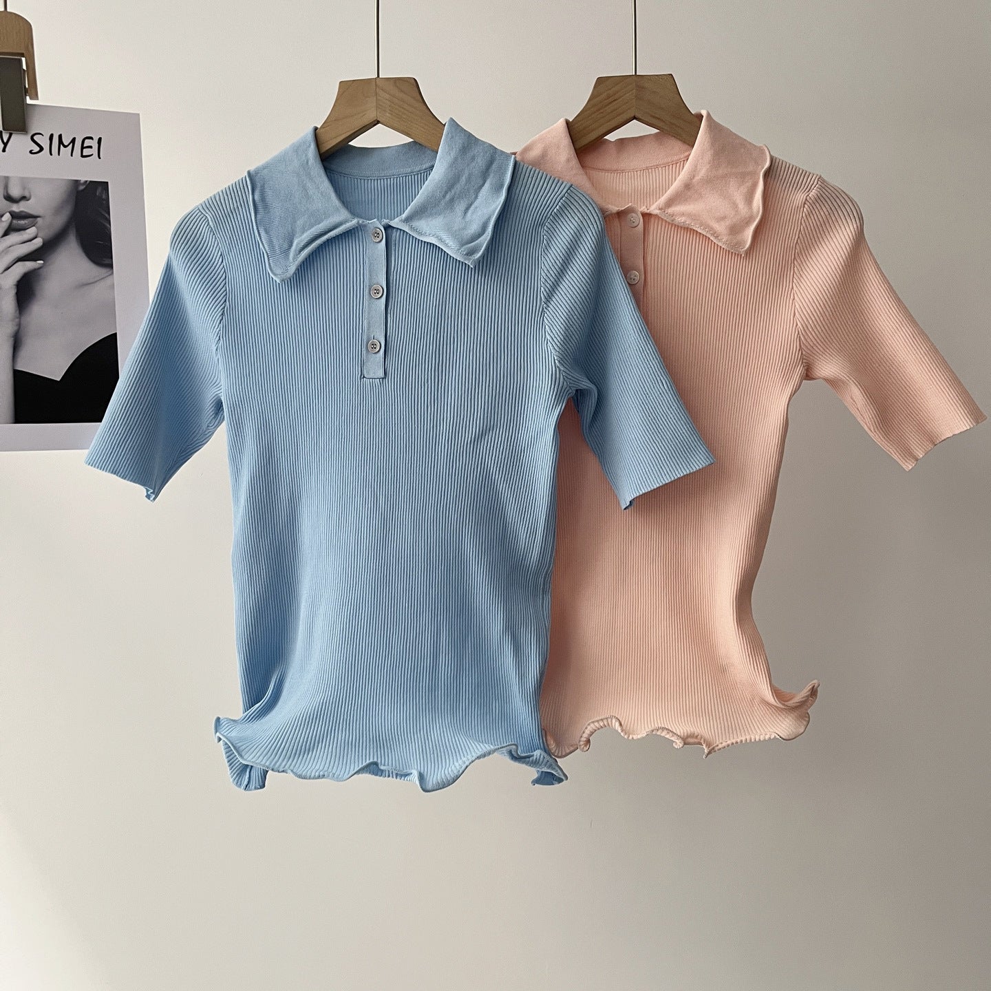 Women's ribbed knit polo tops, blue and blush, button placket, lettuce-edged hem.