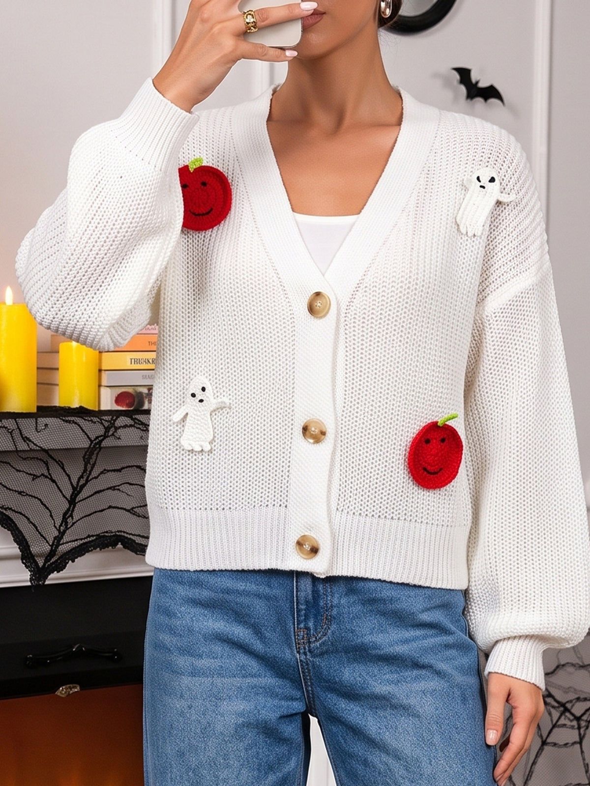 White knit cardigan with V-neck, button front, pumpkin and ghost appliques
