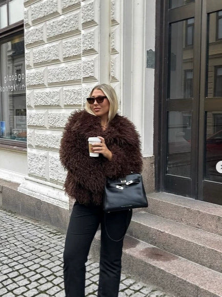 Dark brown shaggy fur coat with roomy sleeves and open front