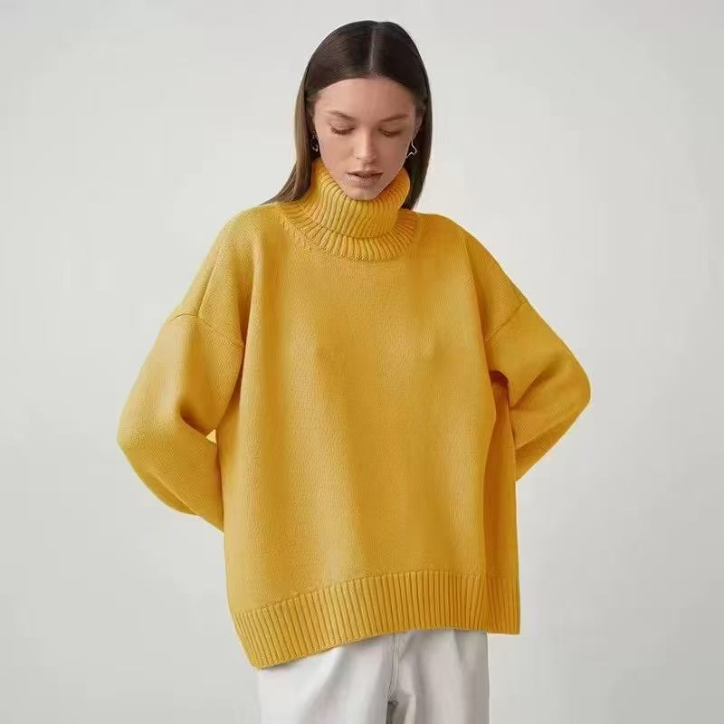 Oversized yellow turtleneck sweater with ribbed roll neck and wide cuffs