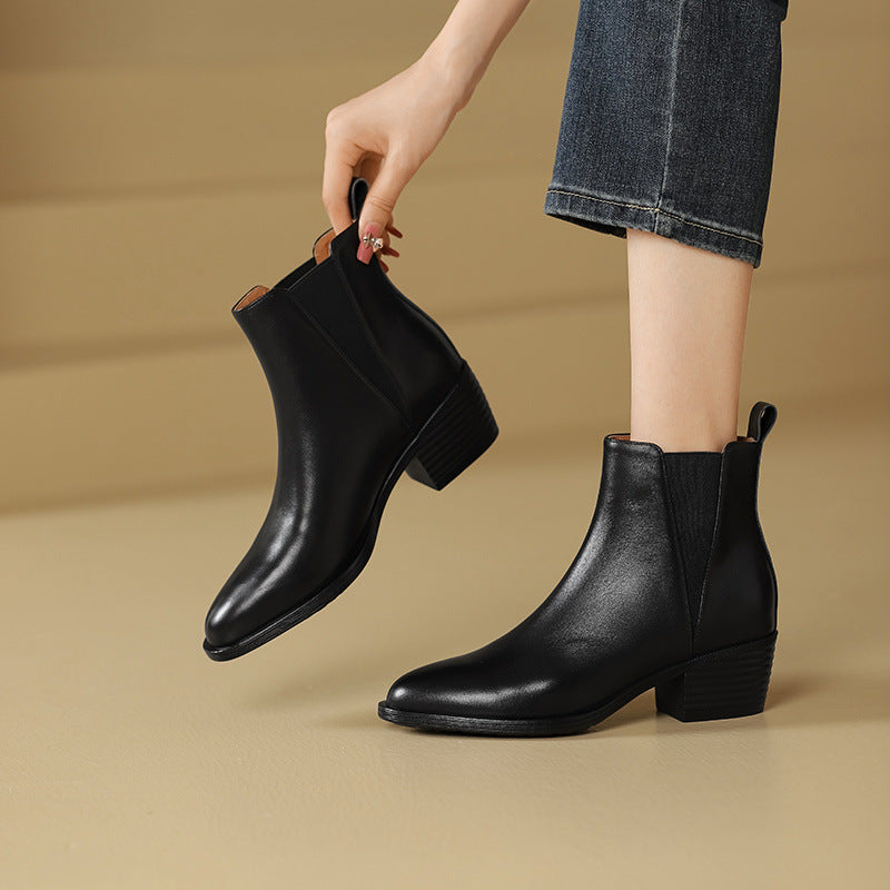 Black leather Chelsea boots with side elastic panels and chunky block heel
