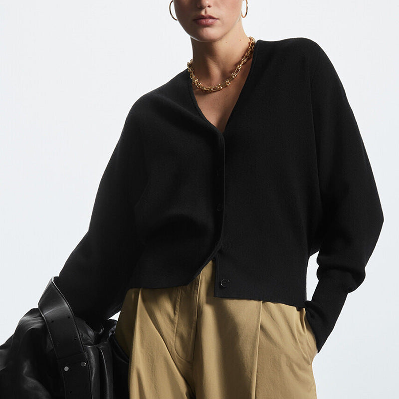 Black boxy V-neck knit cardigan with button front and relaxed drop-shoulder sleeves