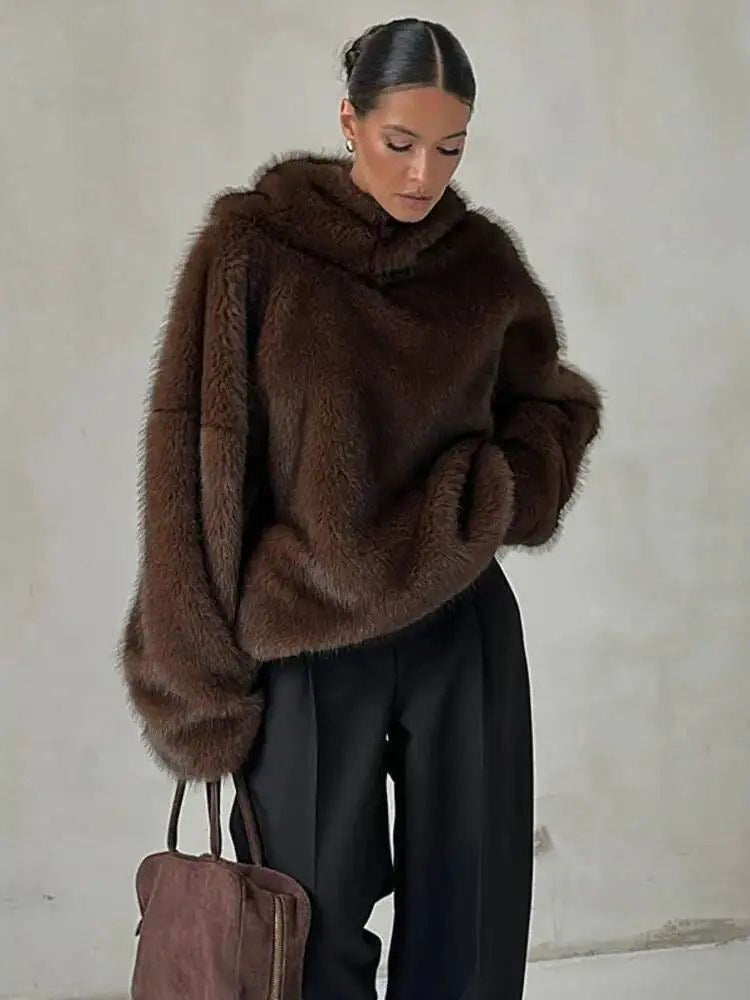 Women’s brown faux fur hooded pullover top with loose, wide sleeves