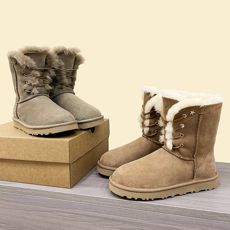 Women’s mid-calf snow boots in gray suede with faux-fur cuff and lace-up detail
