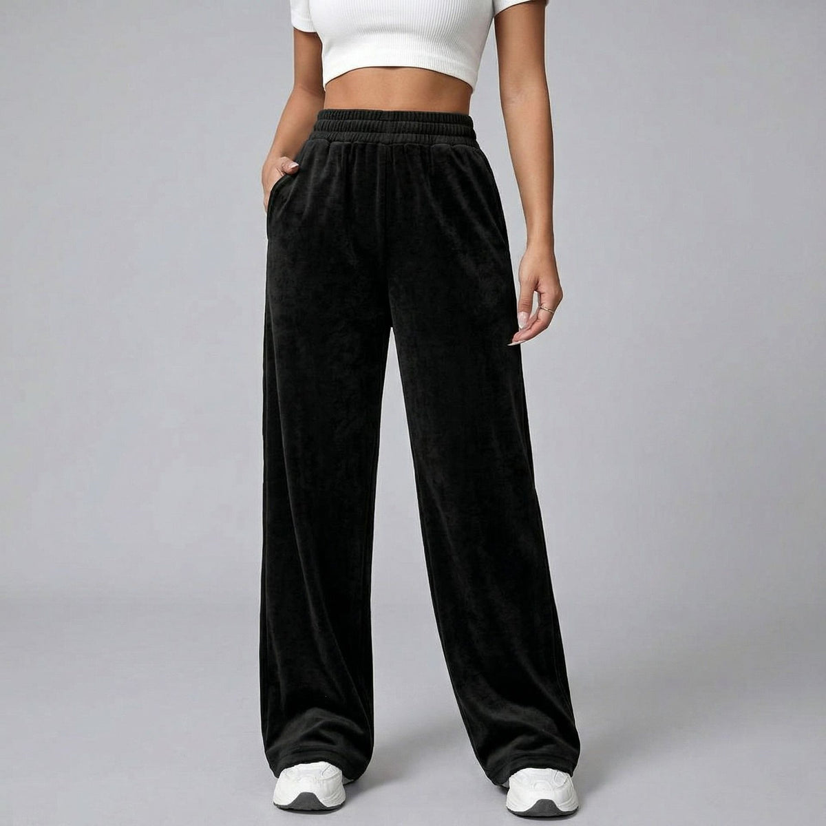 Women’s black wide-leg casual pants with elastic waistband and soft drape
