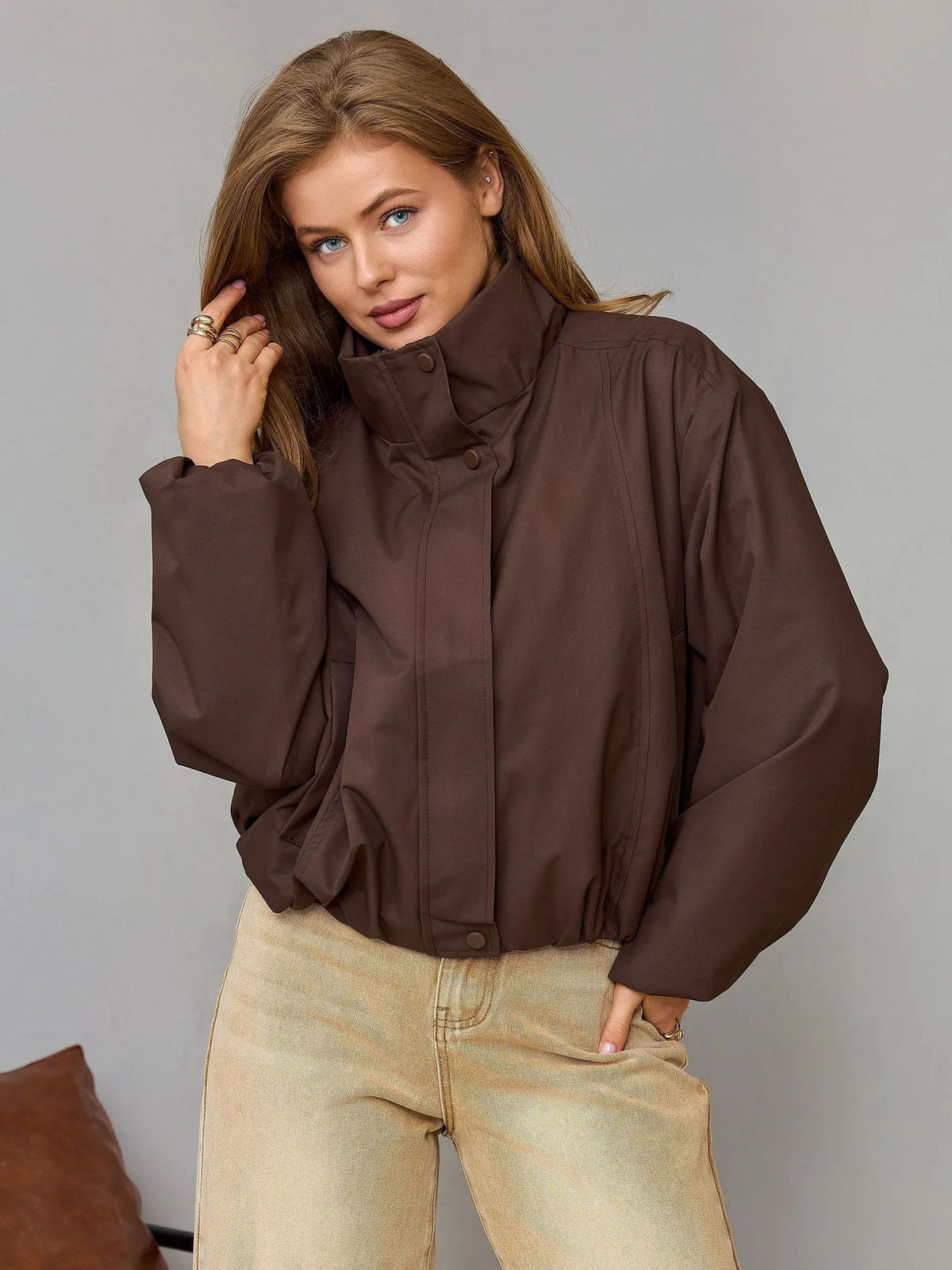 Brown women’s short casual jacket with stand collar and button front