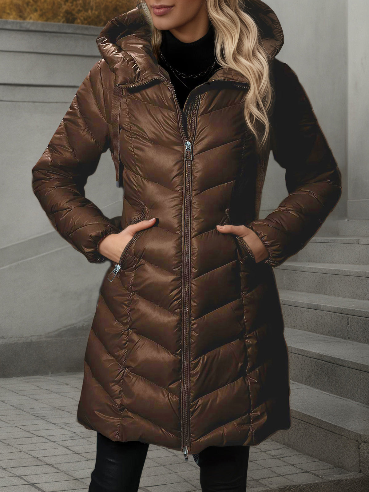 Women's long brown quilted puffer coat with hood and zip-front closure