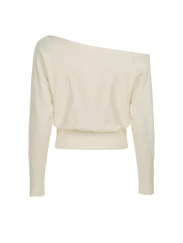 Asymmetric off-shoulder women's sweater in white, cropped long sleeves with ribbed knit