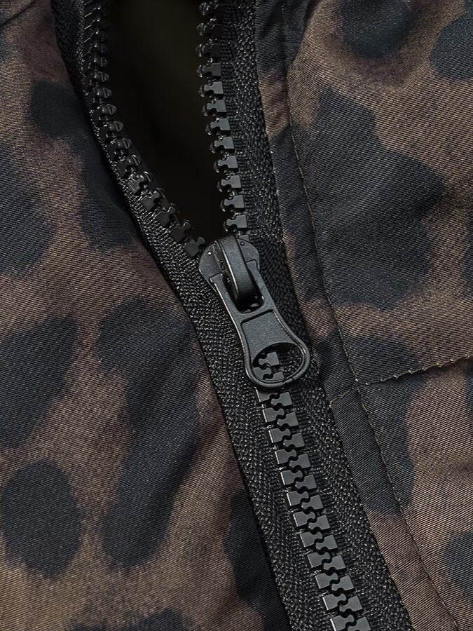 Black zipper pull detail on leopard print hooded puffer jacket