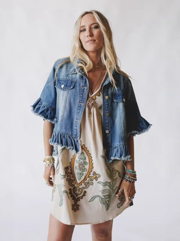 Women's blue denim ruffle-sleeve top with button front and frayed hem