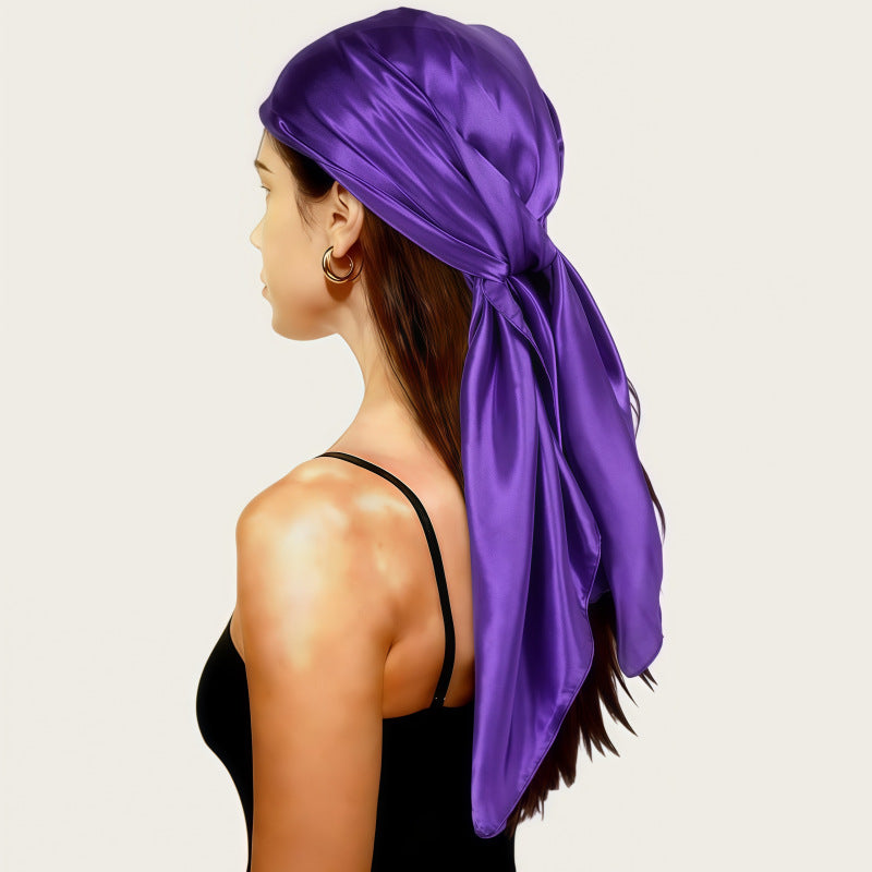 Purple satin square scarf headscarf tied with a long bow at the back