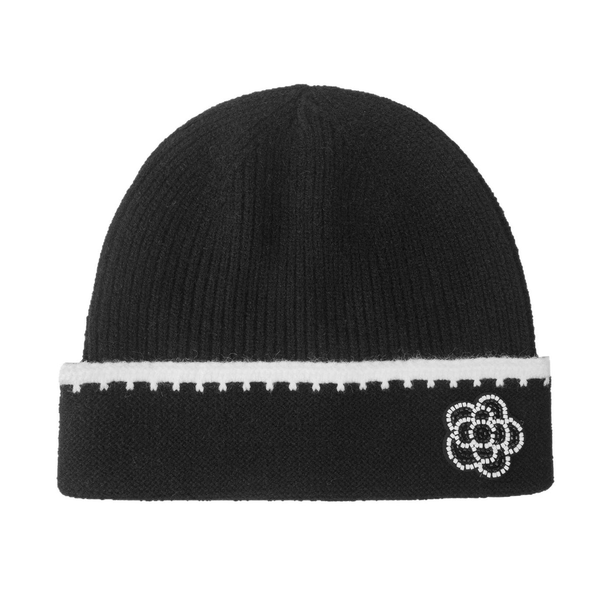 Black knit beanie with white trim and flower emblem
