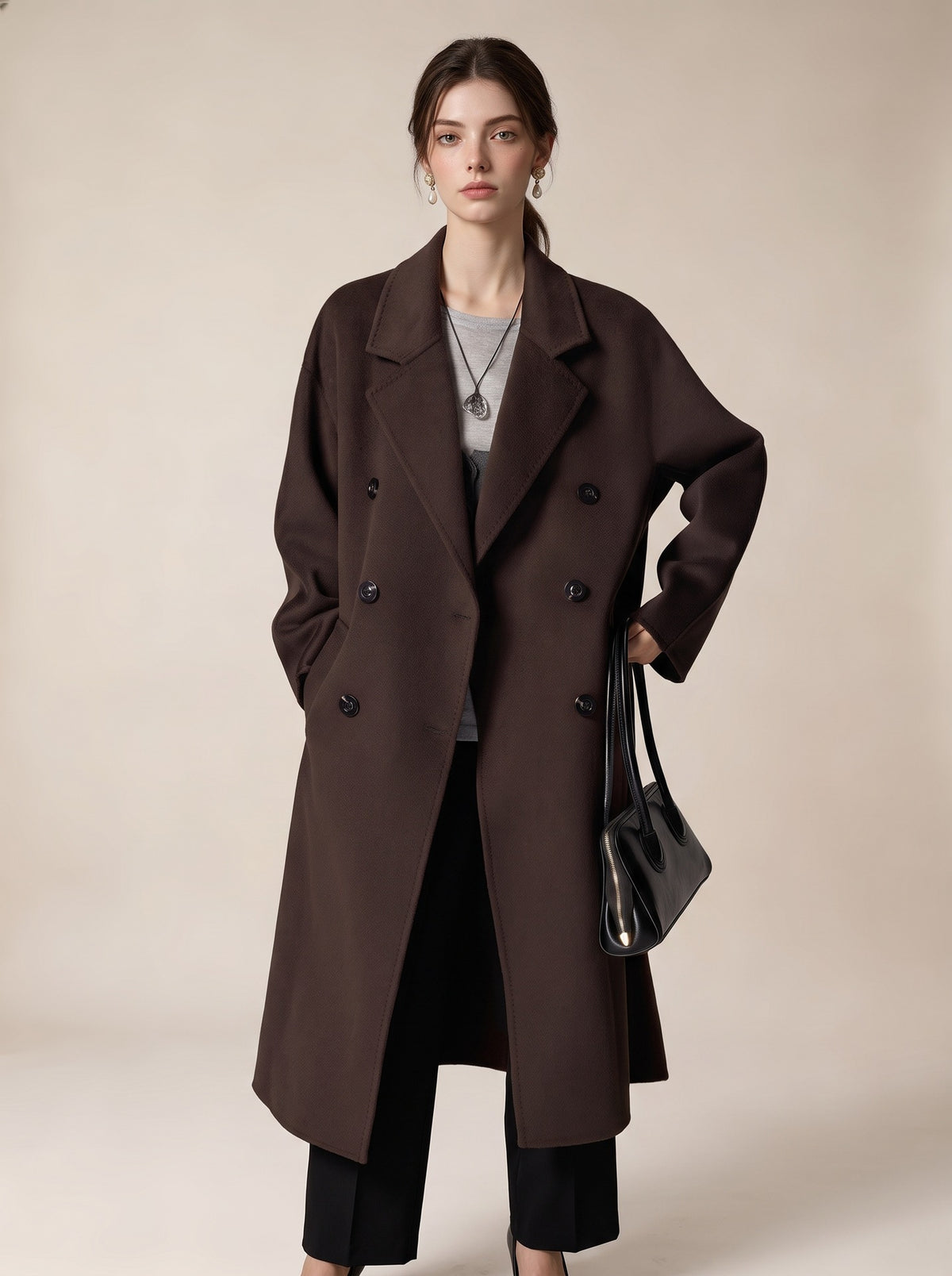 Long dark brown double-breasted wool coat with wide lapels