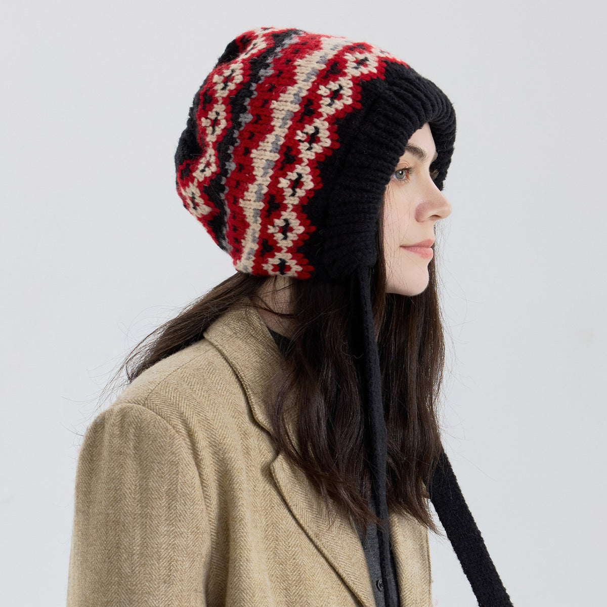 Close-up Fair Isle knit beanie with ribbed cuff, black with red and white pattern
