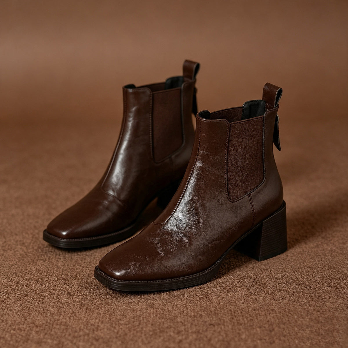 Dark brown Chelsea short boots with square toe, elastic side panels, chunky block heel.