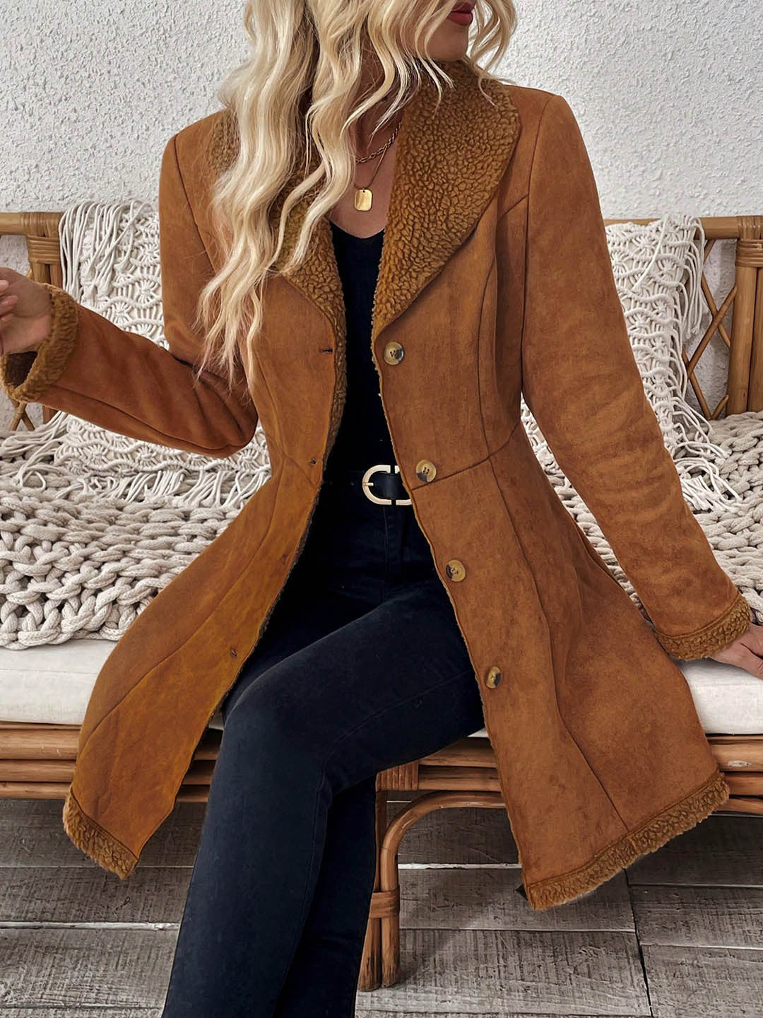 Mid-length brown suede-look jacket with shearling trim, tailored waist, button front.