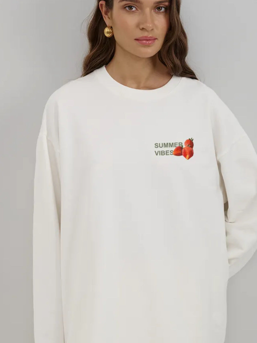 White long-sleeve cotton T-shirt, front small strawberry print near left chest