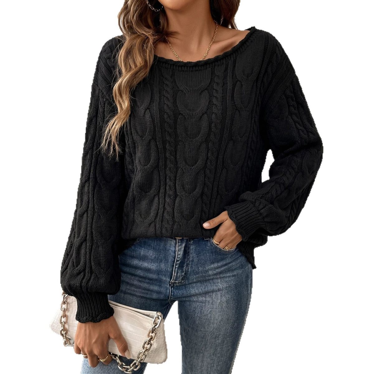 Black cable-knit sweater with a wide neckline and balloon sleeves
