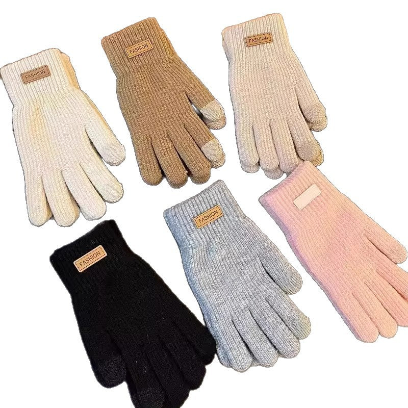 Knitted winter gloves assorted in white, tan, beige, pink, black, and light gray