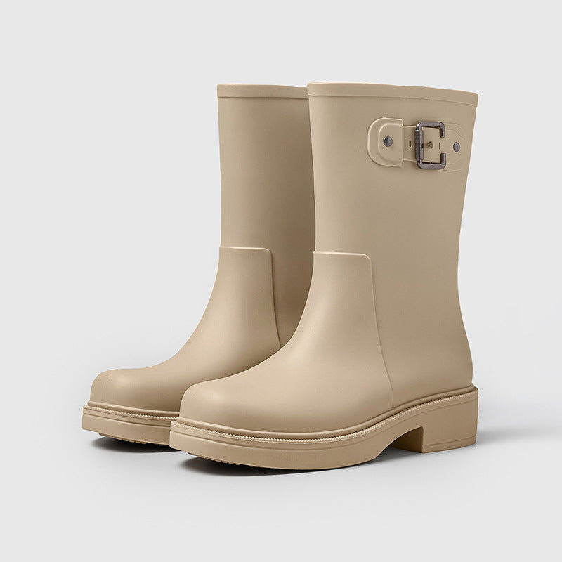 Women's beige mid-calf rain boots with side buckle and flat sole