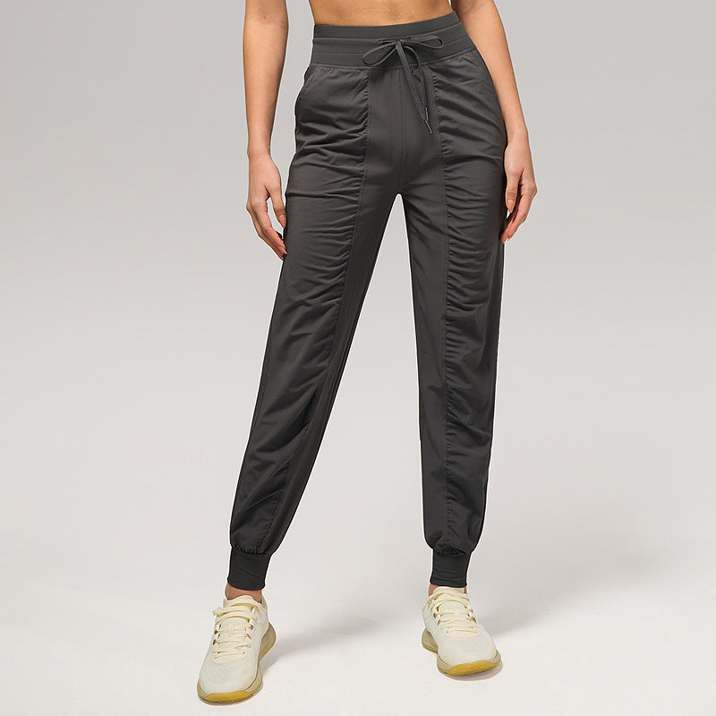 Women's loose jogger sweatpants, black, drawstring waist, side pockets